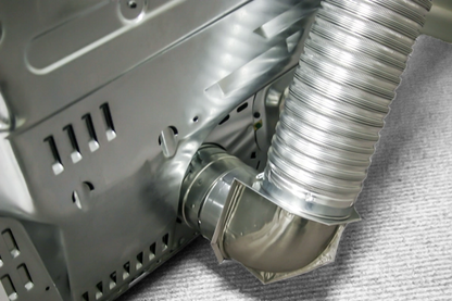 Builder's Best 110108 Close Elbow installed behind a dryer